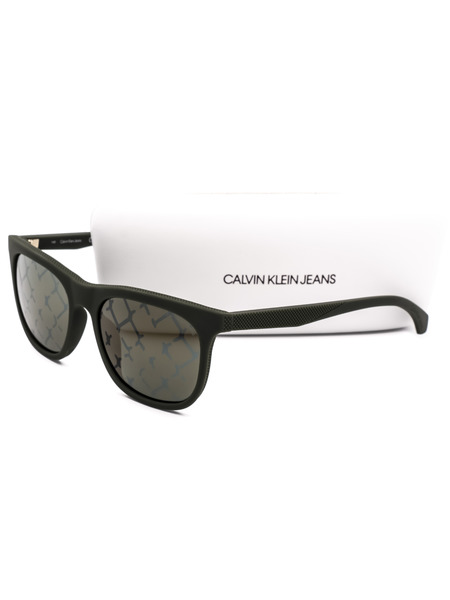 Солнцезащитные очки в темной оправе CKJ818S 310 Calvin Klein Jeans, фото