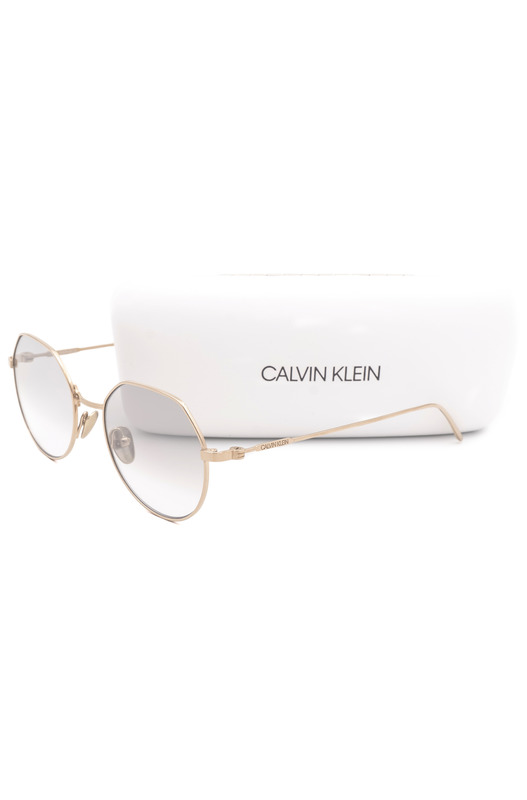 Титановые солнцезащитные очки CK18111S 39173 717 Calvin Klein, фото